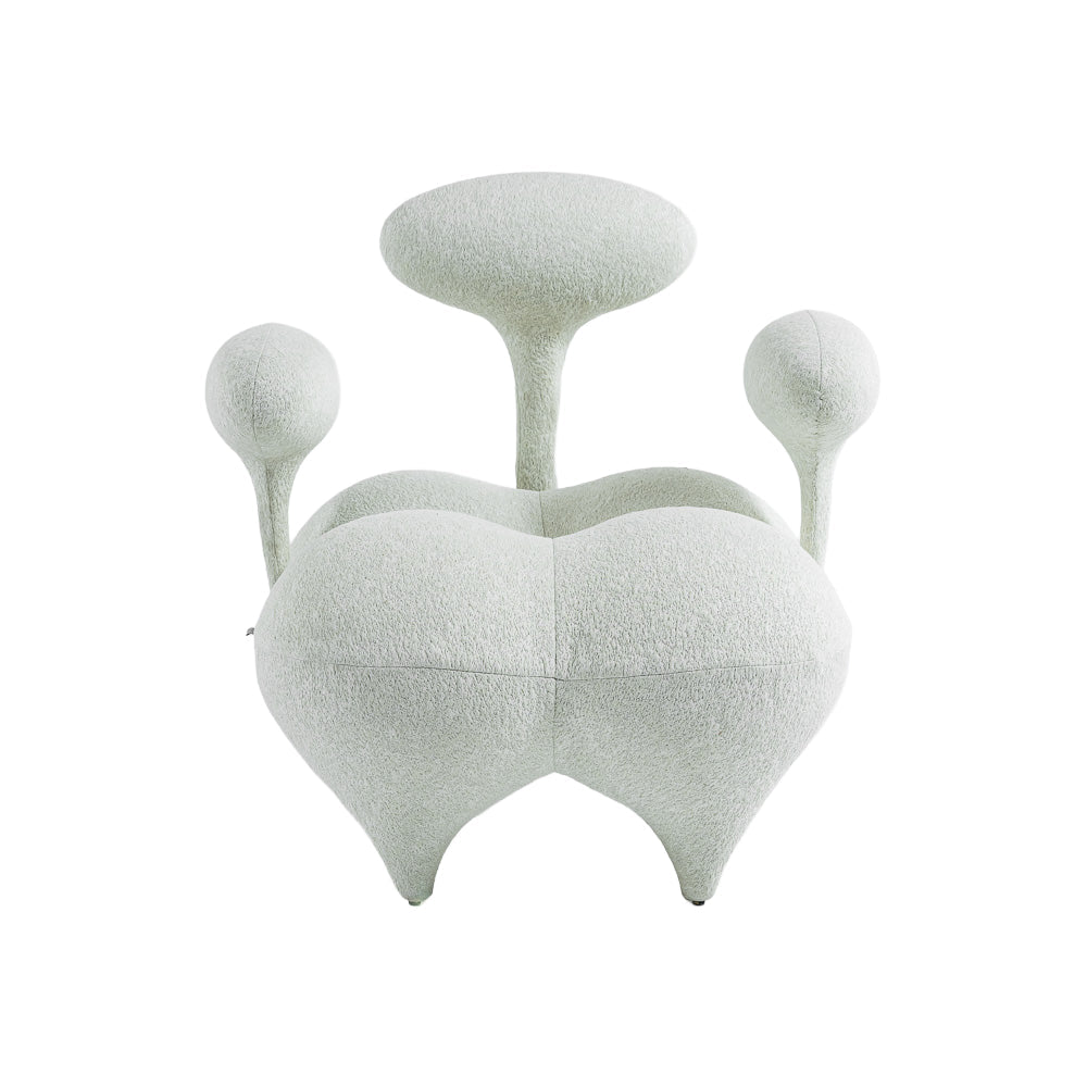 Beige and white Nodus lounge chair from BEACON, stylish and comfortable with modern design, suitable for living rooms.