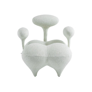 Beige and white Nodus lounge chair from BEACON, stylish and comfortable with modern design, suitable for living rooms.