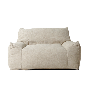 Olefin lounge chair by BEACON, featuring a modern design with plush cushioning and sleek metal legs for stylish comfort.