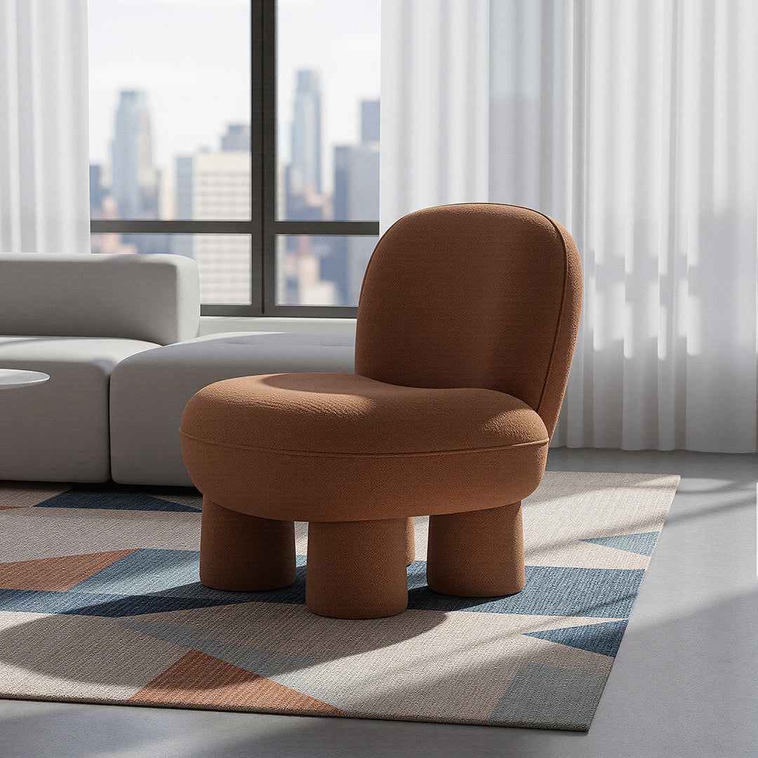 BEACON Pebble Lounge Chair MZ7639 with rounded pebble-shaped design and cushioned seat for modern comfort.