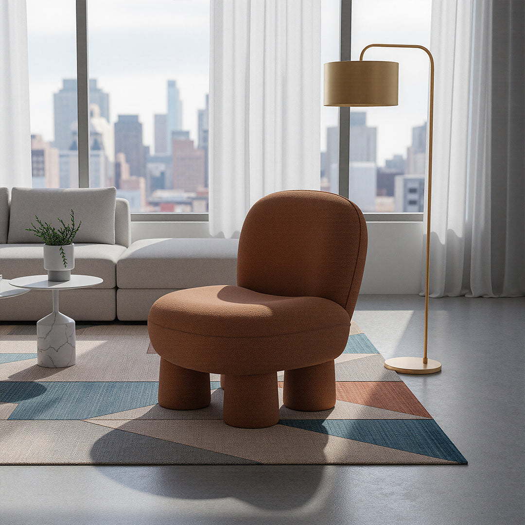 BEACON Pebble Lounge Chair MZ7639 in soft upholstered fabric with a rounded, modern design and wooden legs.