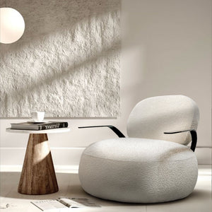 Cloud Comfort fabric armchair by BEACON, featuring plush upholstery and modern design, perfect for stylish living rooms.