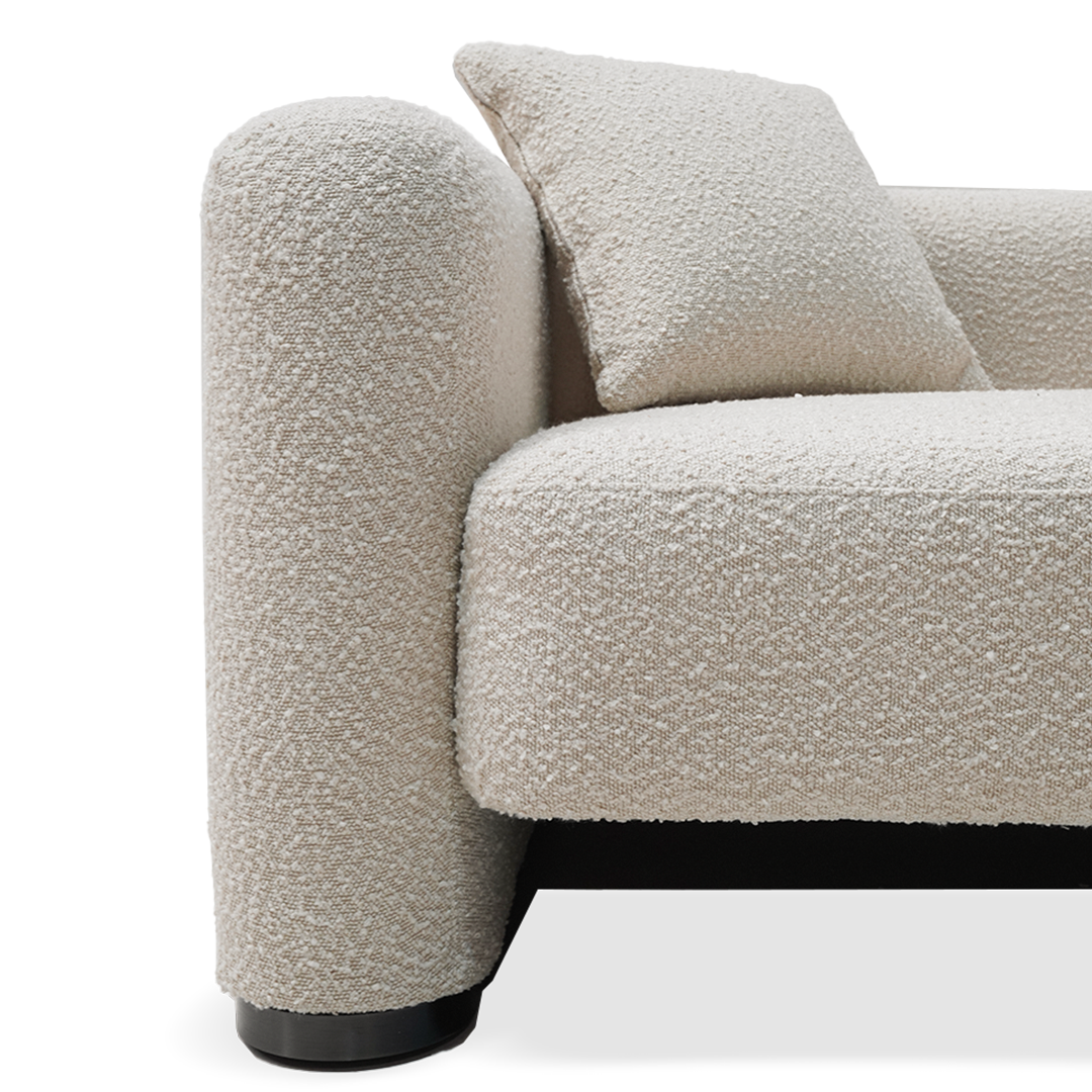 BEACON Soren lounge armchair with plush upholstery and modern design, perfect for a contemporary living space.