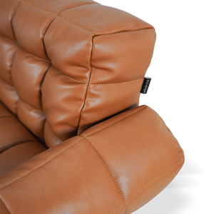 Yabo Lounge Chair LC077 in orange by BEACON, modern lounge chair with sleek design, shown in a contemporary setting.