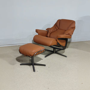 Beacon Meridian lounge chair with matching caramel leather ottoman, modern design, and plush cushioning for comfortable seating.