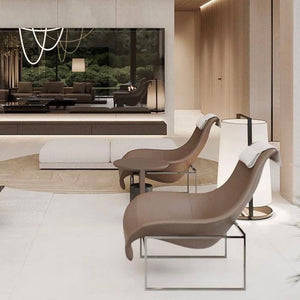 BEACON Saddle Leather Lounge Chair BL-45 with curved saddle seat and modern design, featuring brown leather upholstery and metal legs.