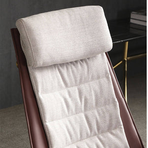 Brown Severo Lounge Chair LC045 by BEACON, showcasing its modern design and plush upholstery in a stylish living space.