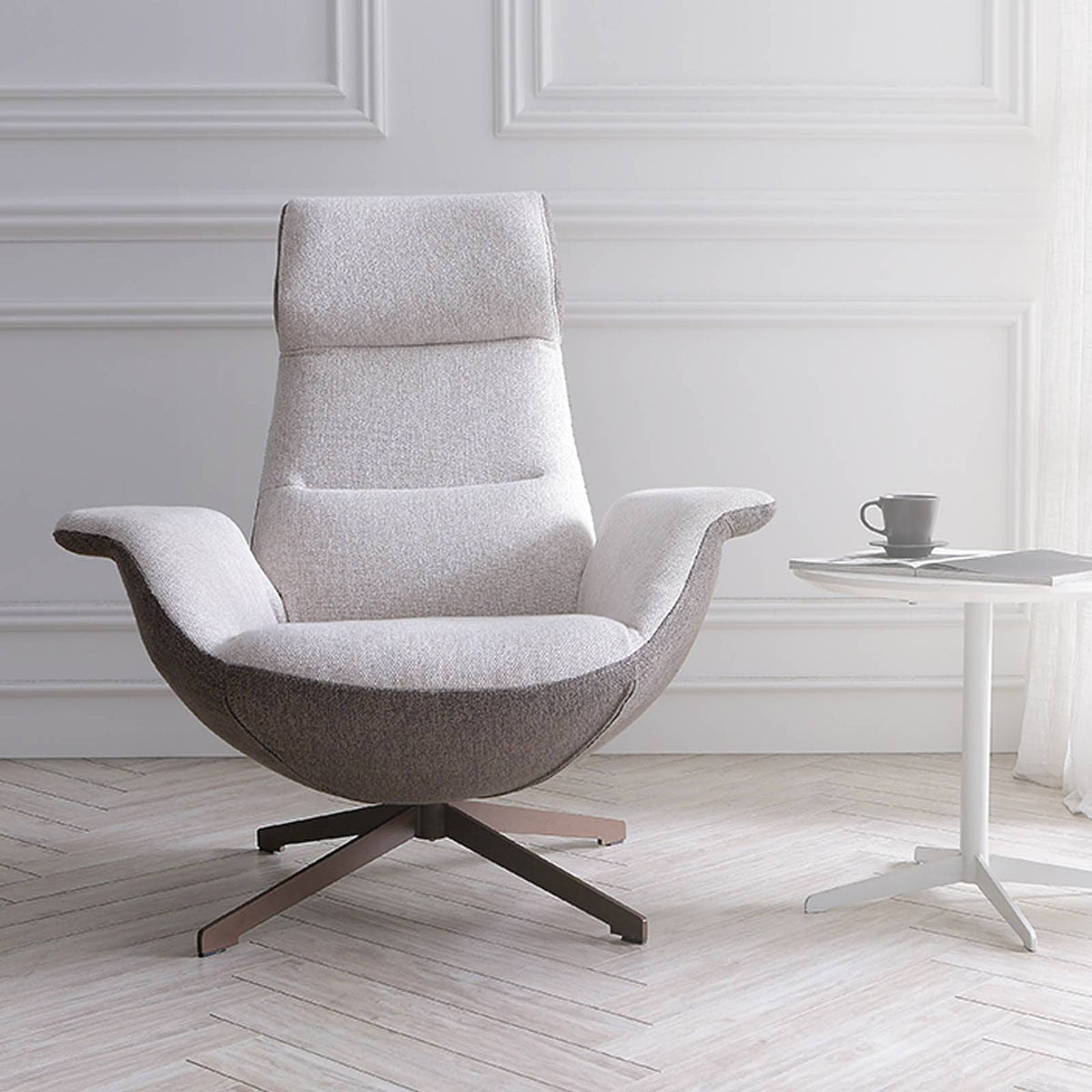 Venezia Swivel Lounge Chair by BEACON, modern lounge chair with cushioned seat and curved backrest in a stylish design.